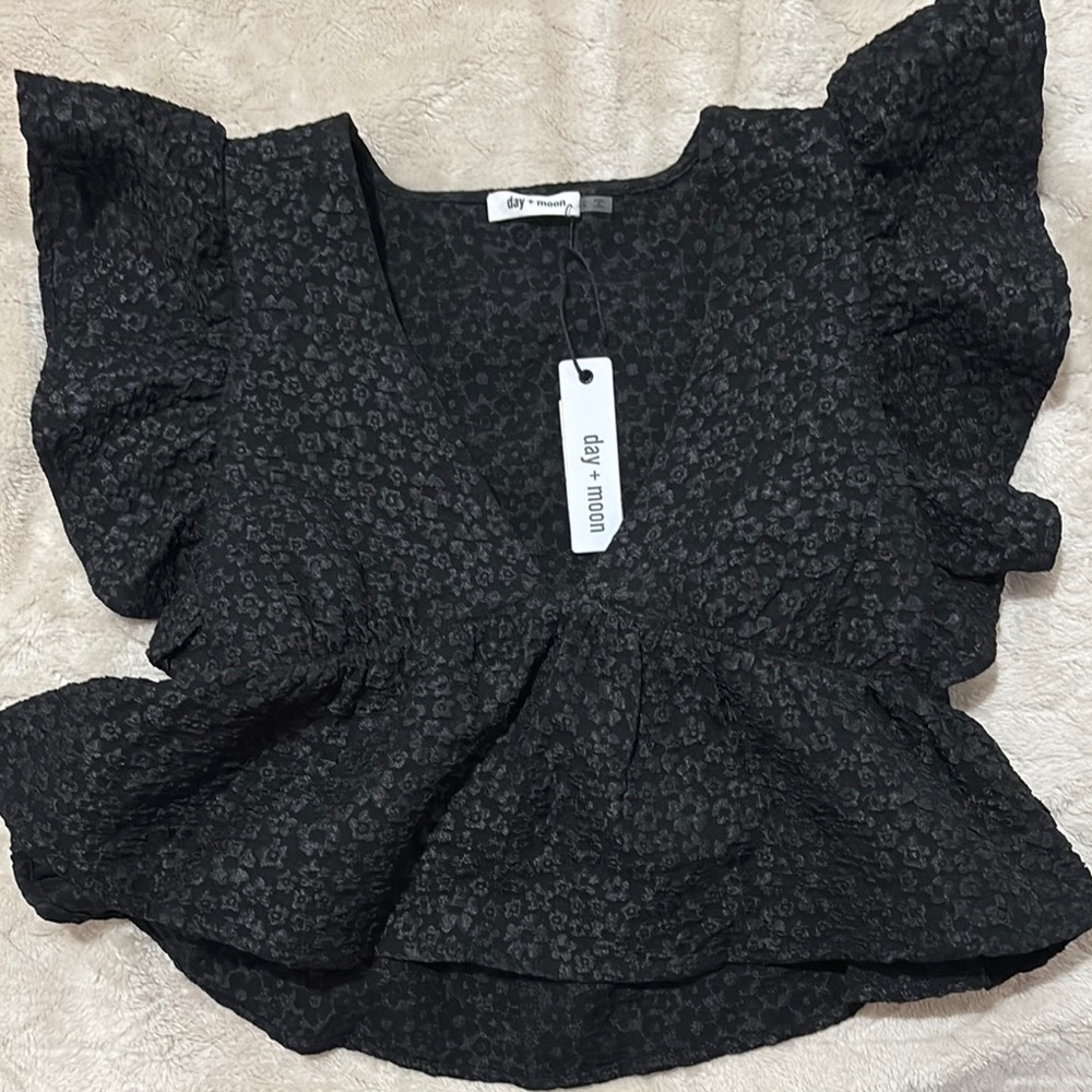 Black and White Flutter Sleeve Peplum Blouse